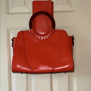 Elegant Orange Handbag with Wooden Handles